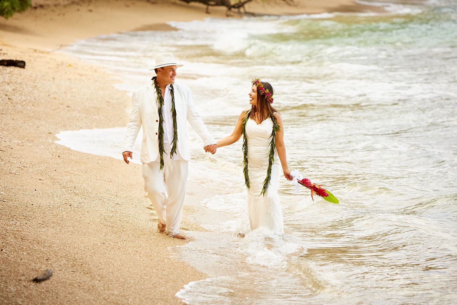 Claudia walking on the beach on her wedding day